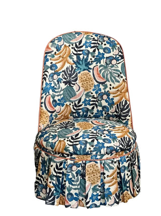 Decorative chair with a tropical pattern on a white background