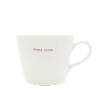 White mug with 'drama queen' text on a white background